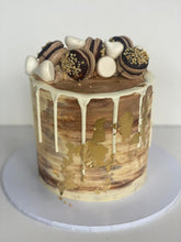 Load image into Gallery viewer, Macaron and Meringue Loaded Cake with Gold Leaf detail