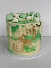 Load image into Gallery viewer, Macaron and Meringue Loaded Cake with Gold Leaf detail