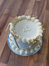 Load image into Gallery viewer, Bow-tiful Cabinet Cake
