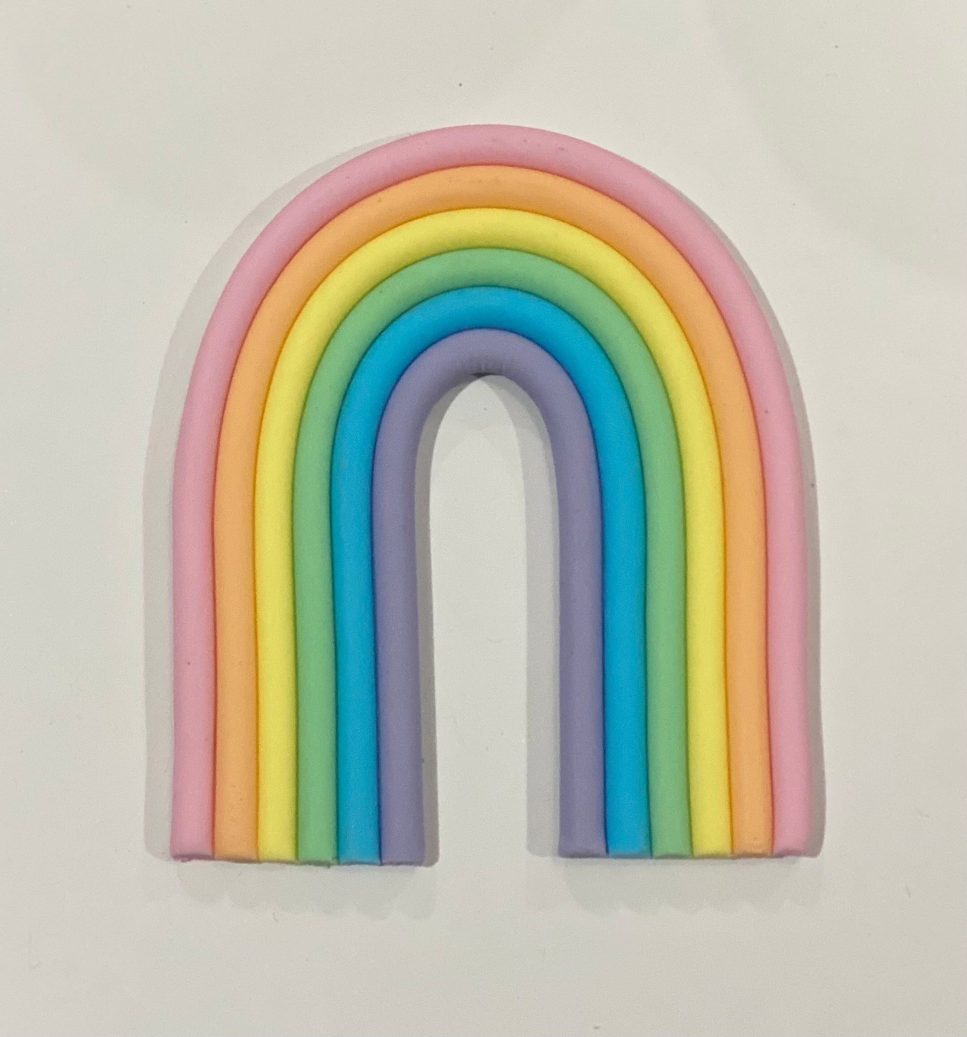 How to Make an Easy Fondant Rainbow Cake Decoration - Eats Amazing.